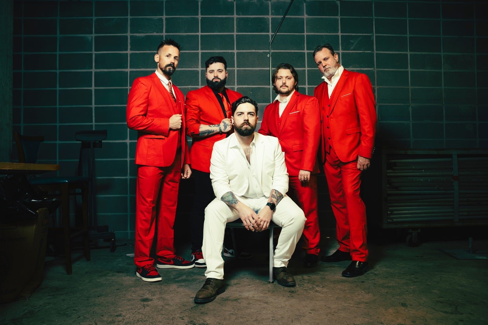 Count The Years — the five band members in red suits